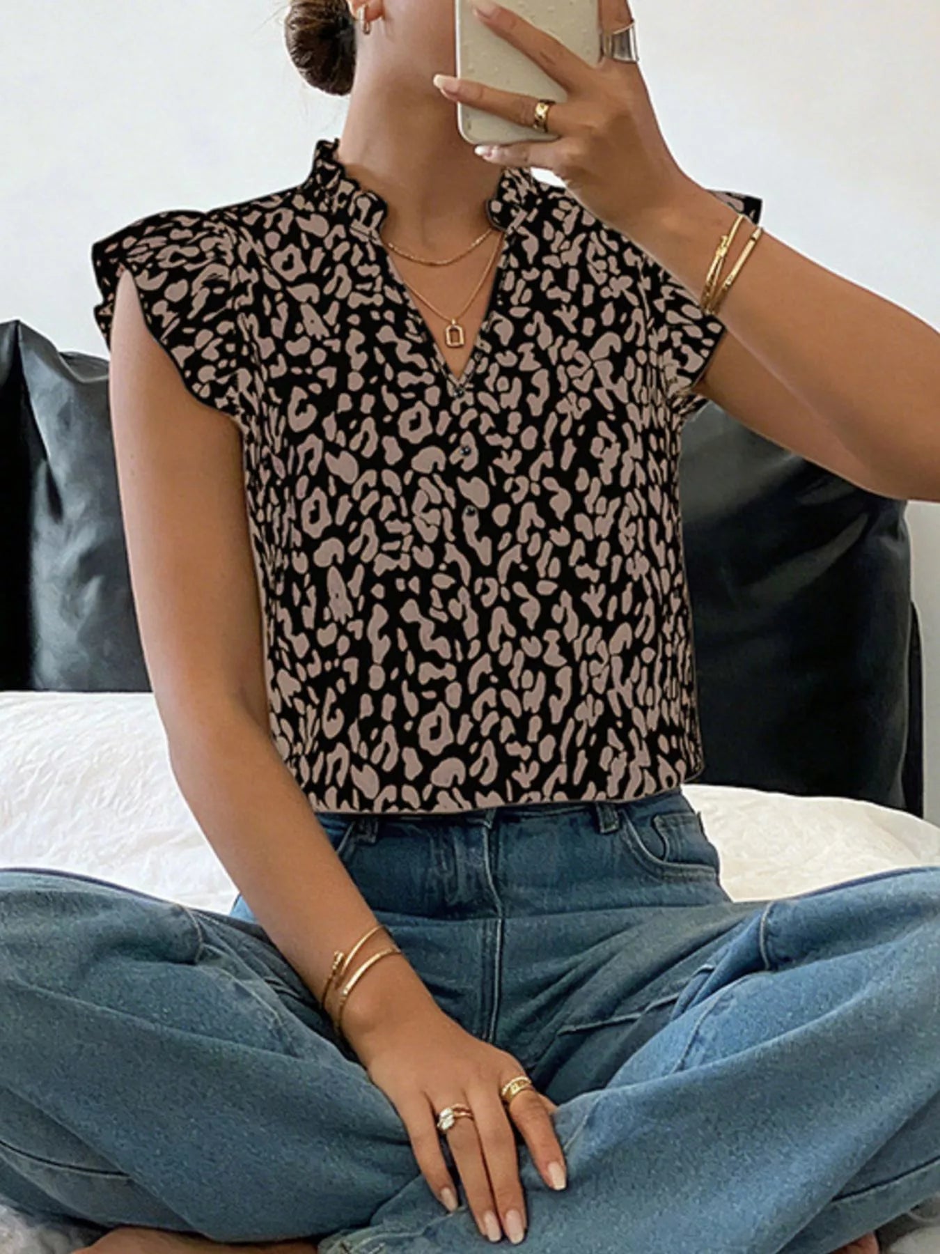 Orange-red leopard print blouse with ruffle sleeves, stylish women's top from Trendsi.