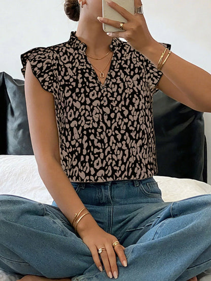 Orange-red leopard print blouse with ruffle sleeves, stylish women's top from Trendsi.
