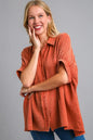 Orange-red Umgee plus size cotton gauze mineral wash button-down shirt with a relaxed fit and casual style.