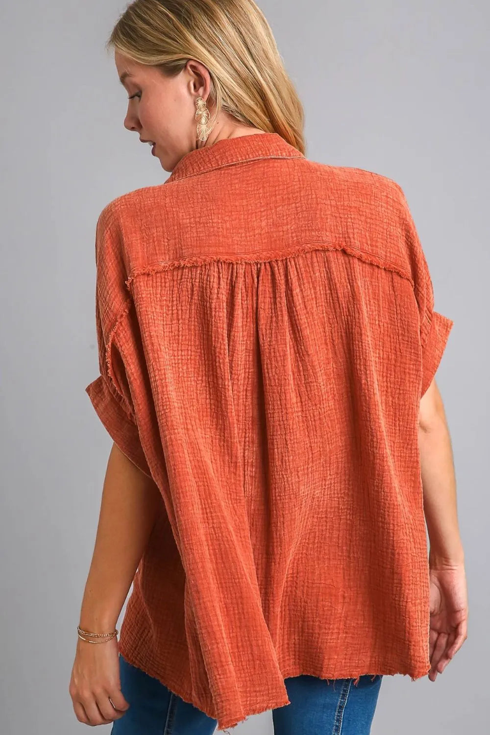 Plus size Umgee cotton gauze button-down shirt in orange-red mineral wash, casual and comfortable for everyday wear.