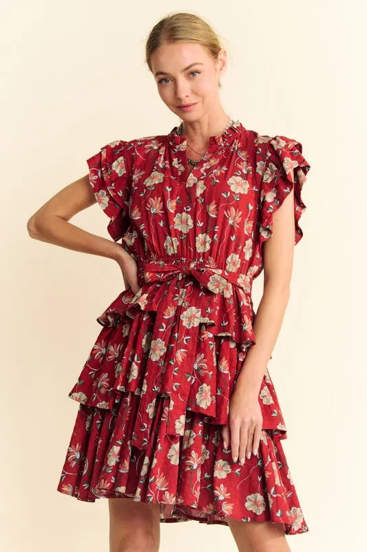 Orange rust Davi & Dani mini dress with ruffle flutter sleeves, tie belt, and tiered skirt, perfect for casual summer wear.