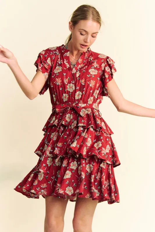 Orange rust Davi & Dani tiered mini dress with ruffle flutter sleeves and tie belt, perfect for casual and summer wear.