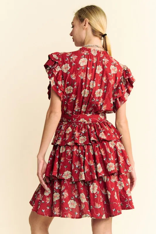 Orange rust Davi & Dani mini dress with ruffle flutter sleeves, tie belt, and tiered skirt, stylish and feminine for warm weather.