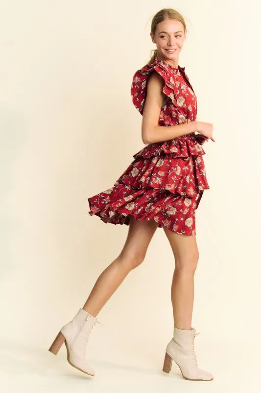 Orange rust Davi & Dani tiered mini dress with ruffle flutter sleeves and tie belt, perfect for casual or summer wear.