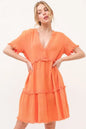 Orange washed frayed detail tiered dress from Trendsi, featuring a relaxed fit and layered design perfect for casual wear.