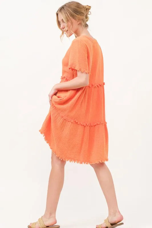 Orange washed frayed detail tiered dress by Trendsi, featuring a flowy design and layered tiers for a casual, stylish look.