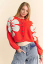 Orange Davi & Dani flower contrast round neck long sleeve cardigan with ribbed cuffs and hem, stylish and cozy for casual wear.