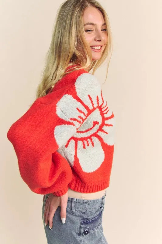 Orange Davi & Dani flower contrast round neck long sleeve cardigan with ribbed cuffs and floral pattern, casual and stylish.