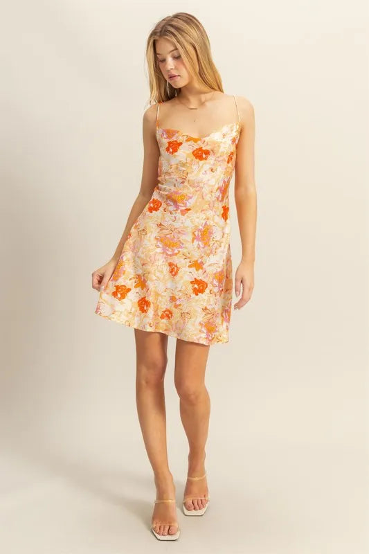 Orange floral satin mini dress with cowl neck from HYFVE, featuring a flirty, stylish design perfect for elegant occasions.