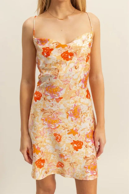 Orange floral satin mini dress with a cowl neck, designed by HYFVE for a flirty, stylish look.