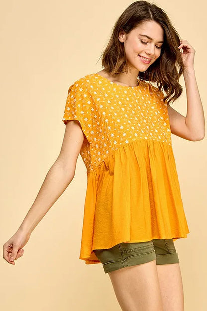 Orange lime 'N' Chili embroidered short sleeve pleated babydoll top by Trendsi, featuring delicate embroidery and a flowy, feminine fit.
