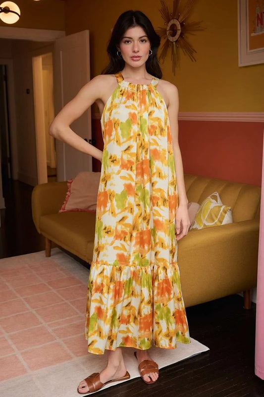 Orange watercolor print satin maxi dress with halter neck from Mittoshop, stylish and flowy for elegant summer occasions.