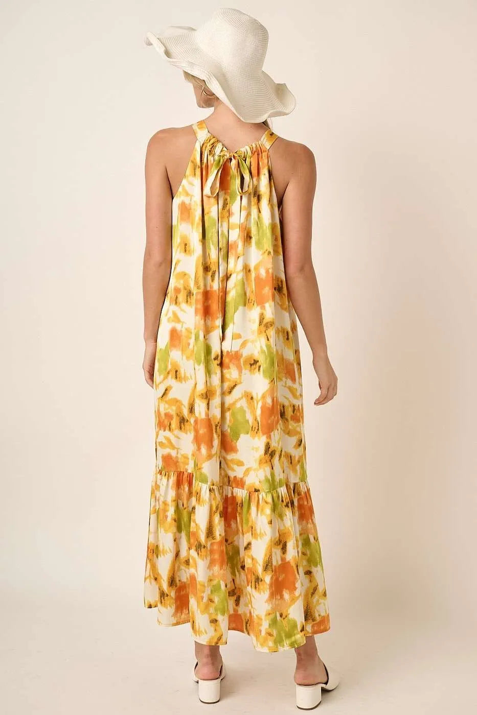 Orange watercolor print satin maxi dress with halter neckline by Mittoshop, featuring a flowing elegant design.