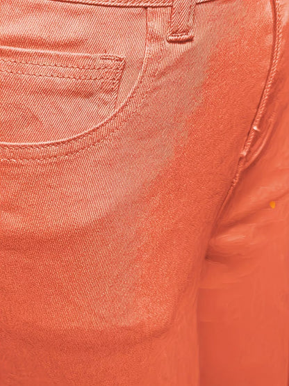 Orange raw hem wide leg jeans by Trendsi, featuring a relaxed fit and stylish distressed detailing.