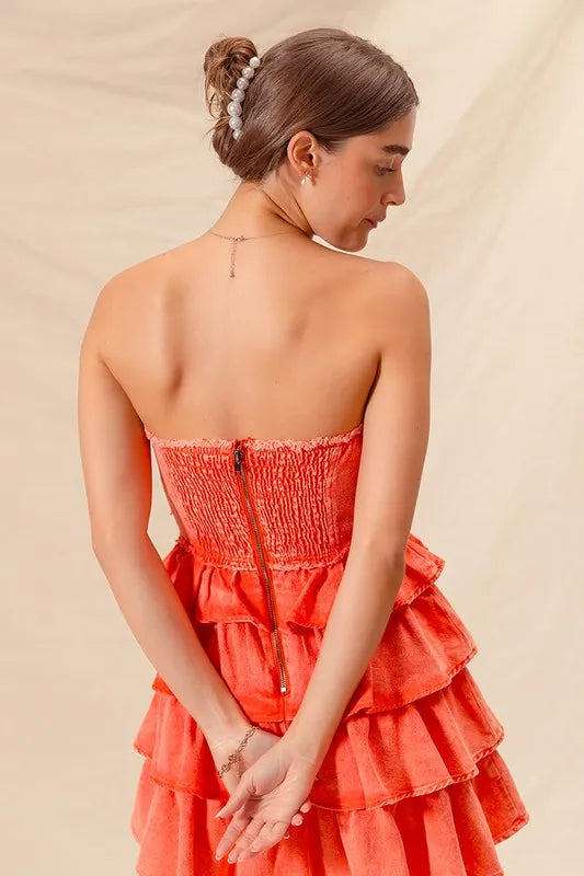 Orange strapless ruffle layered cheer-up dress by Trendsi, featuring a playful design perfect for game day or casual outings.