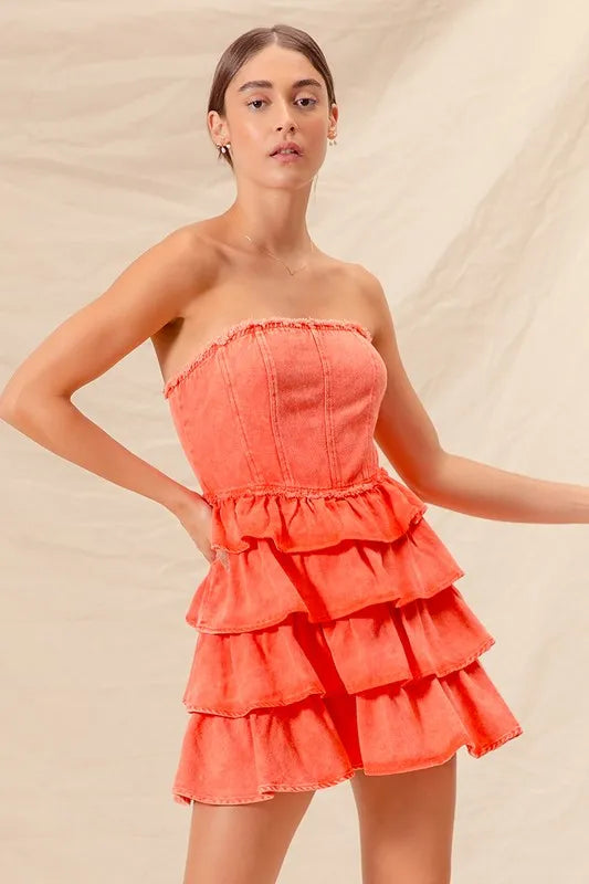 Orange strapless cheer dress with ruffle layered design by Trendsi, perfect for game day events.