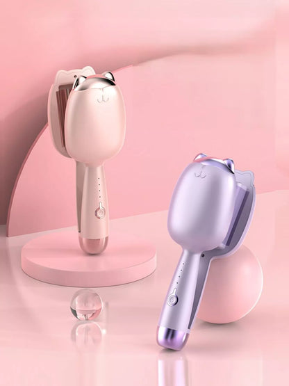 Cat-shaped heated curling iron by Trendsi with a pale blush finish and European plug, designed for easy styling.