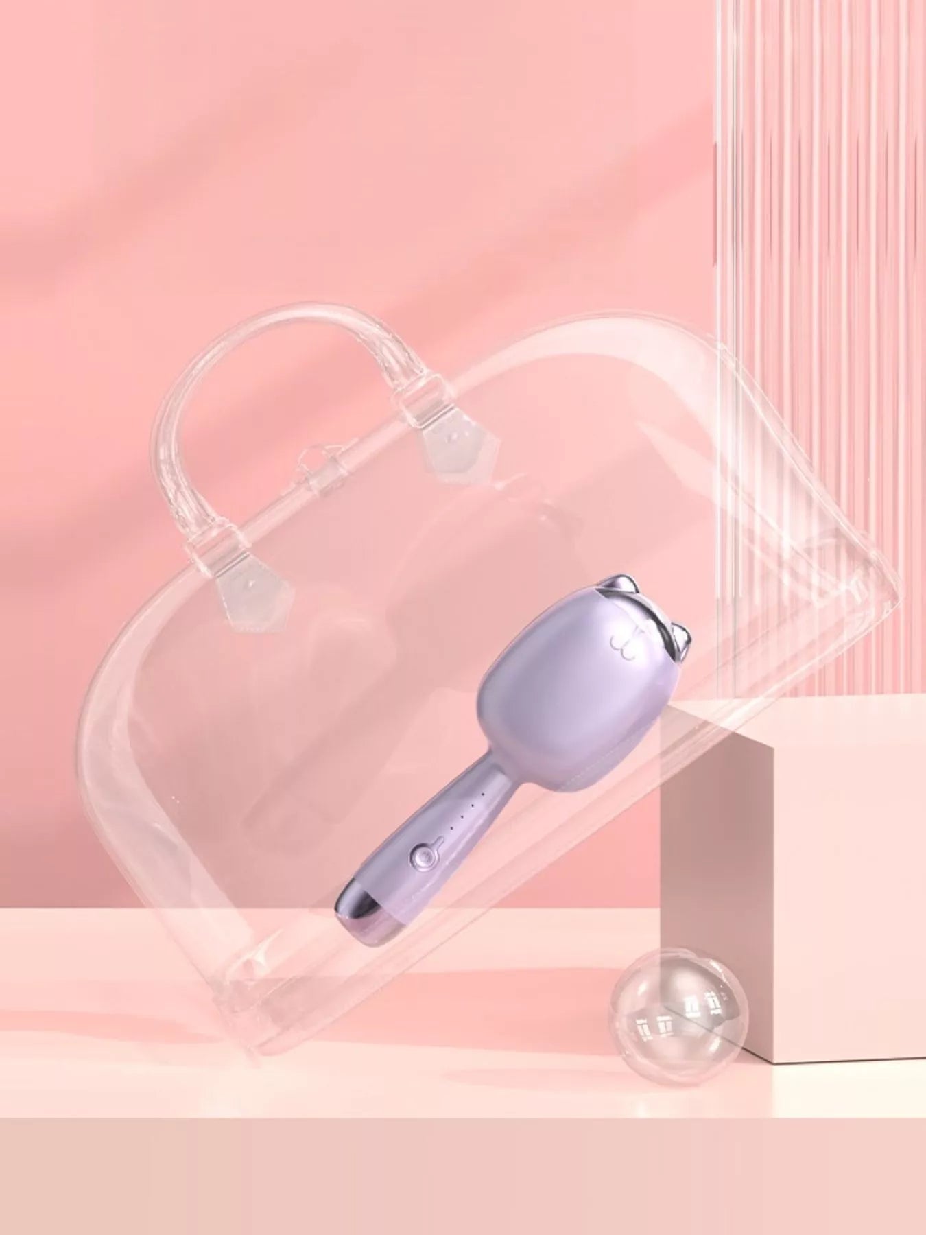 Cat-shaped heated curling iron by Trendsi in pale blush with European plug, stylish and easy to use for curling hair.