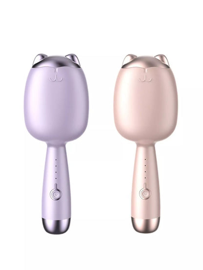 Cat-shaped heated curling iron from Trendsi in pale blush color with European plug for styling curls and waves.