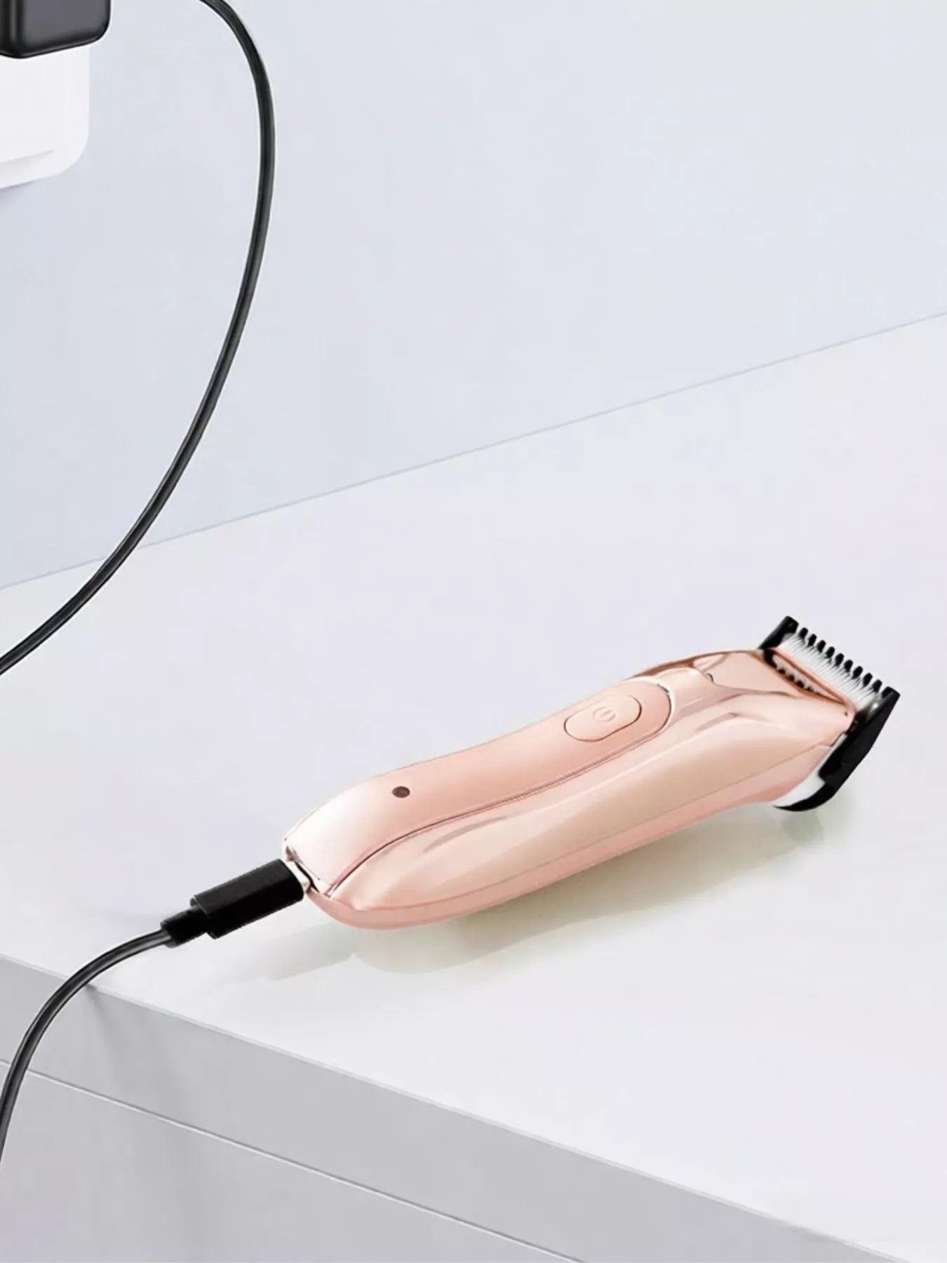 Trendsi 2-piece portable rechargeable hair removal kit with pale blush design, compact and easy to use for at-home hair removal.