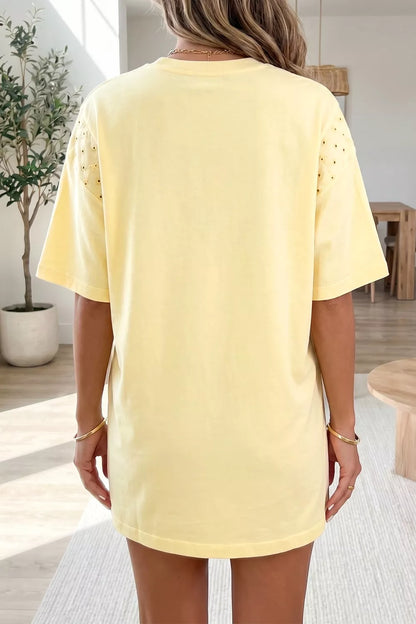 Pastel yellow Trendsi round neck half-sleeve T-shirt dress displayed on a hanger, casual and comfortable women's dress.