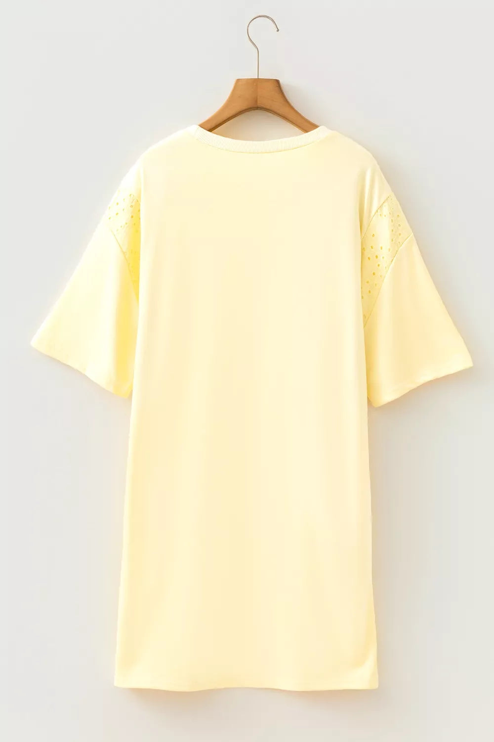 Pastel yellow round neck half sleeve T-shirt dress by Trendsi, casual and comfortable for everyday wear