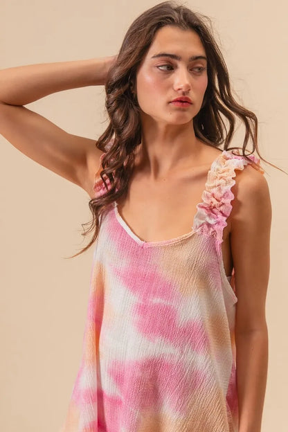 Peach and pink tie dye printed textured woven fabric with ruffled details, designed by Trendsi.