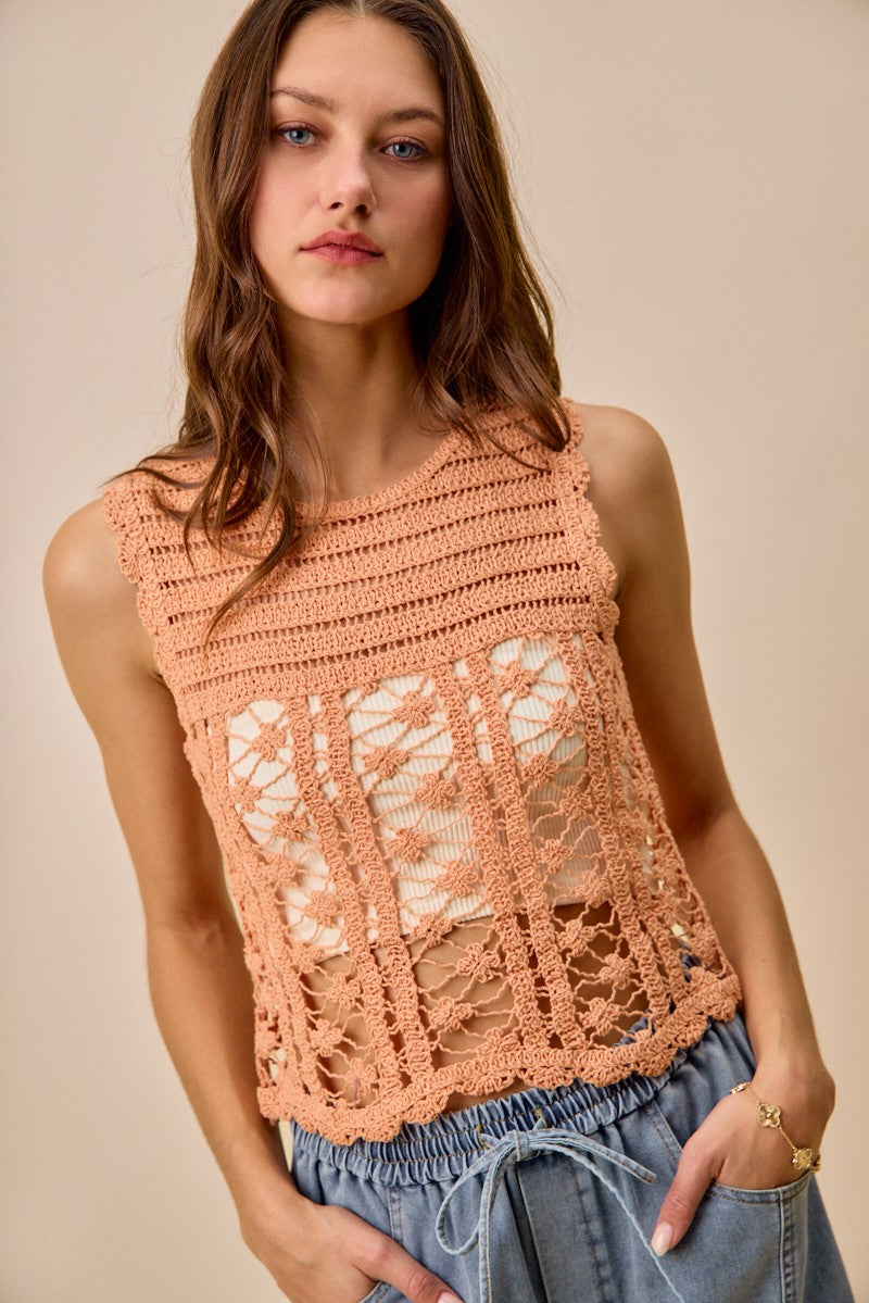 Peach crochet knitted lace sweater tank top from SO ME by Trendsi, featuring delicate lace details and a sleeveless design.