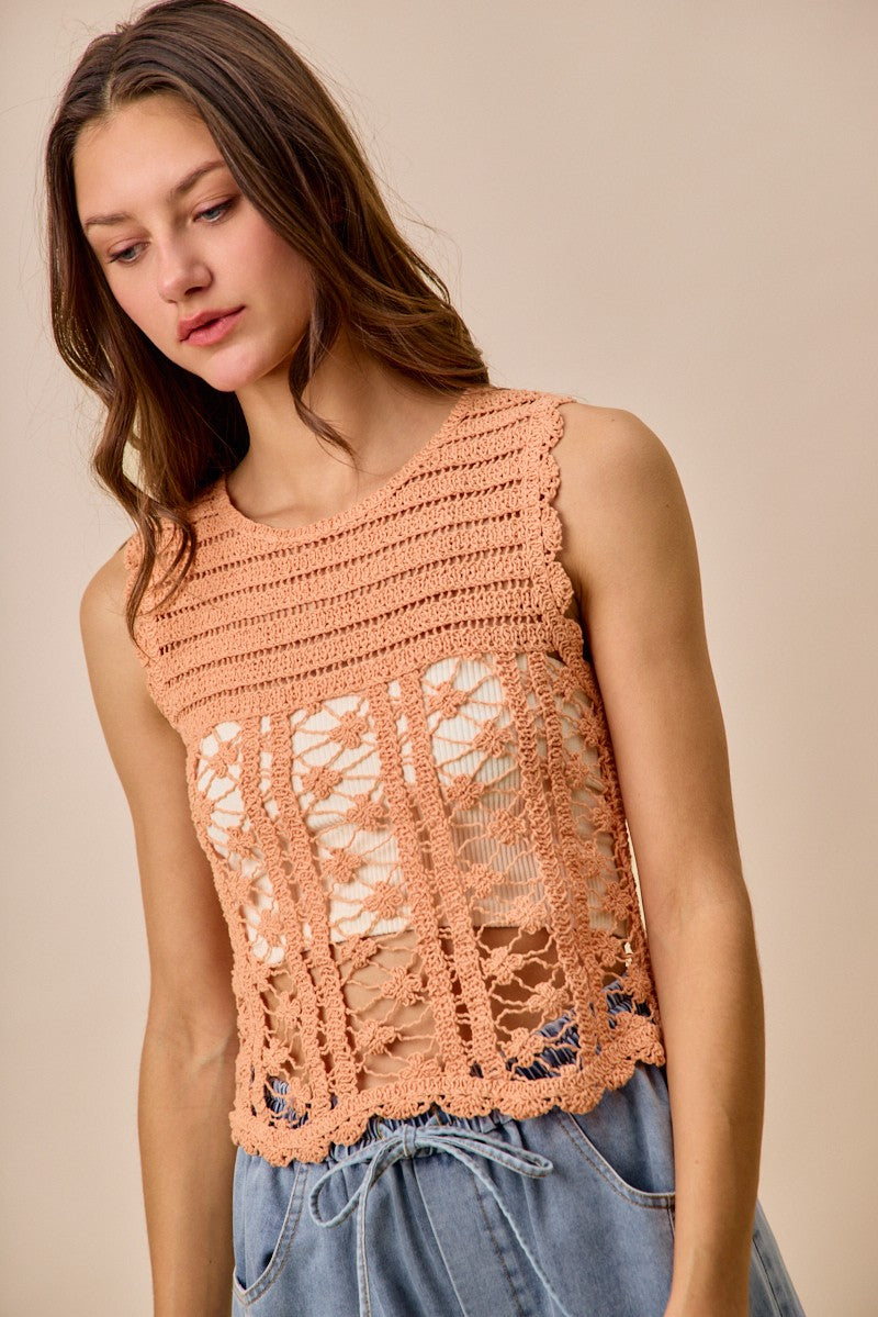Peach crochet knitted lace sweater tank top by Trendsi, featuring intricate lace details and a comfortable fitted style.
