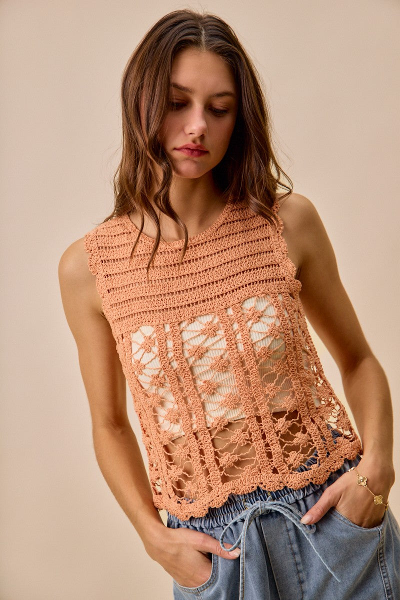 Peach crochet knitted lace sweater tank top by Trendsi, featuring intricate lace details and a relaxed fit.