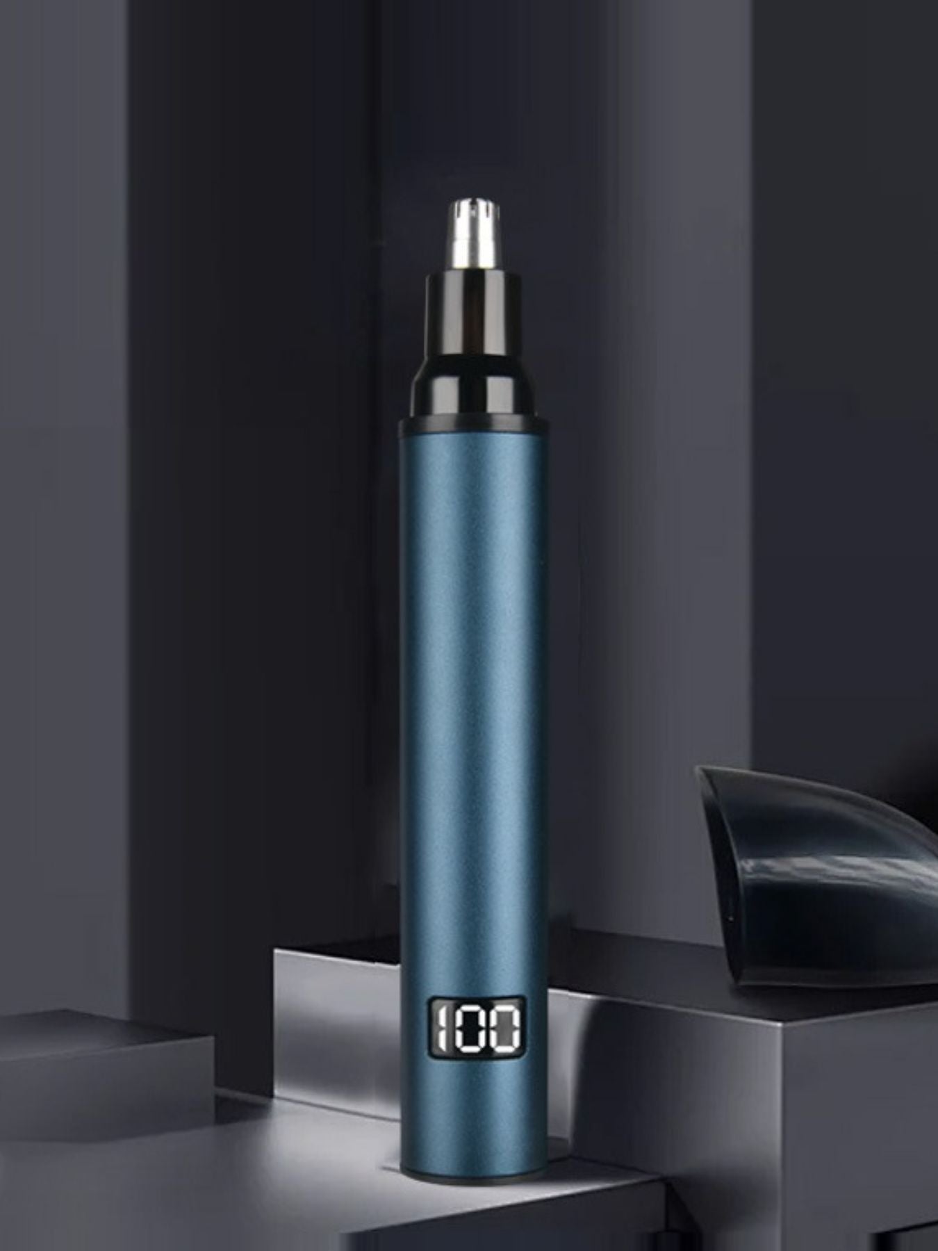 Peacock blue rechargeable digital display nose hair trimmer from Trendsi with compact design and precision trimming blades.