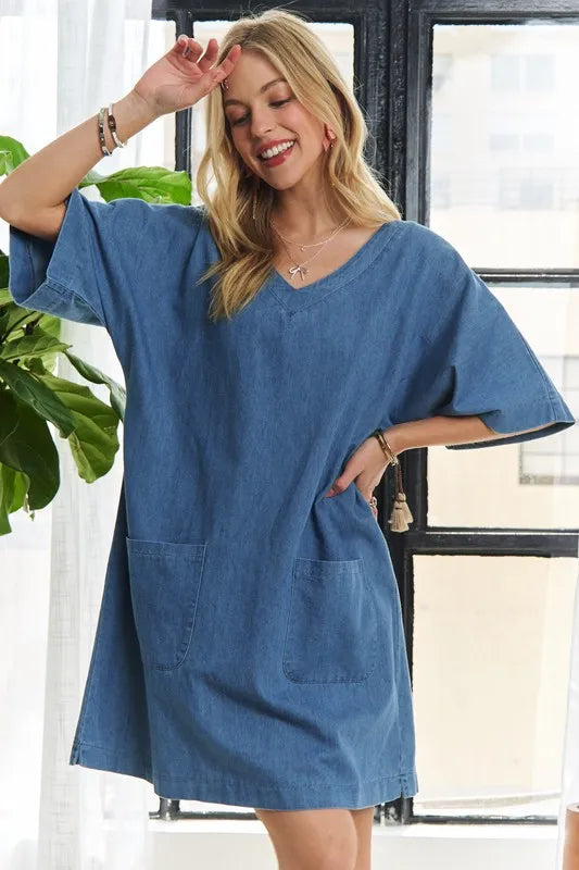 Peacock blue ADORA V-neck half sleeve mini denim dress by Trendsi, styled with a fitted silhouette and classic denim fabric.