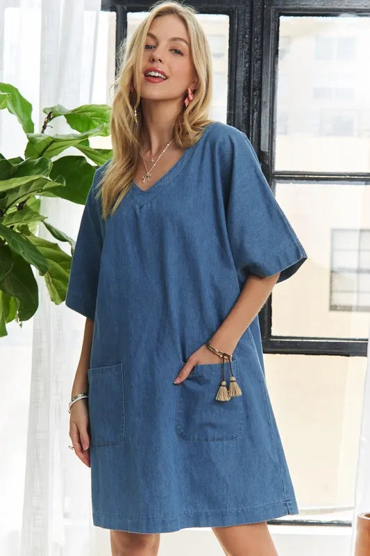 Peacock blue ADORA V-neck half sleeve mini denim dress by Trendsi, casual fit with stylish short sleeves and a flattering mini length.