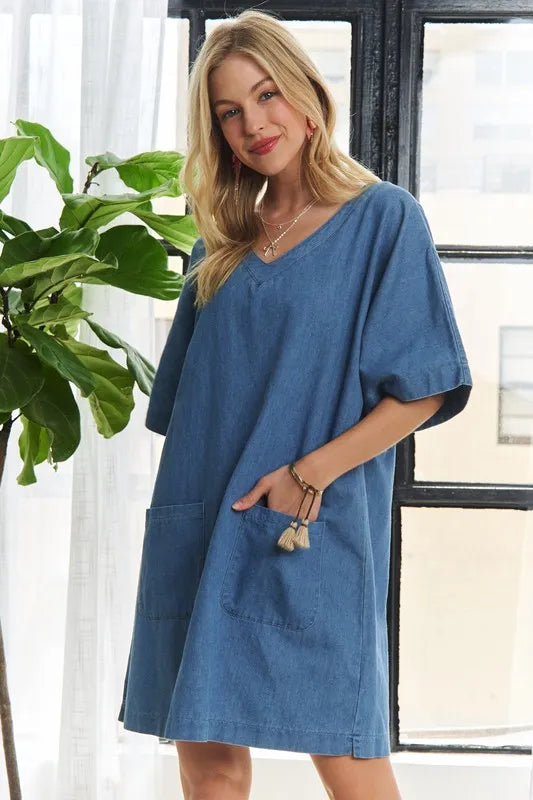 Peacock blue ADORA V-neck half sleeve mini denim dress by Trendsi, featuring a casual fit and stylish V-neck design.