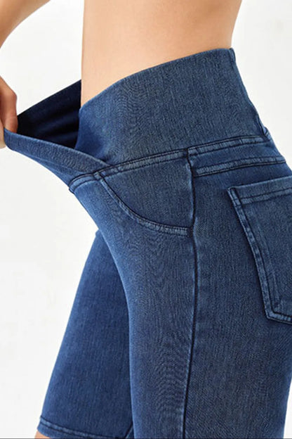 Peacock blue Basic Bae asymmetrical waist denim shorts with front pockets, stylish and casual women's trendy denim shorts.