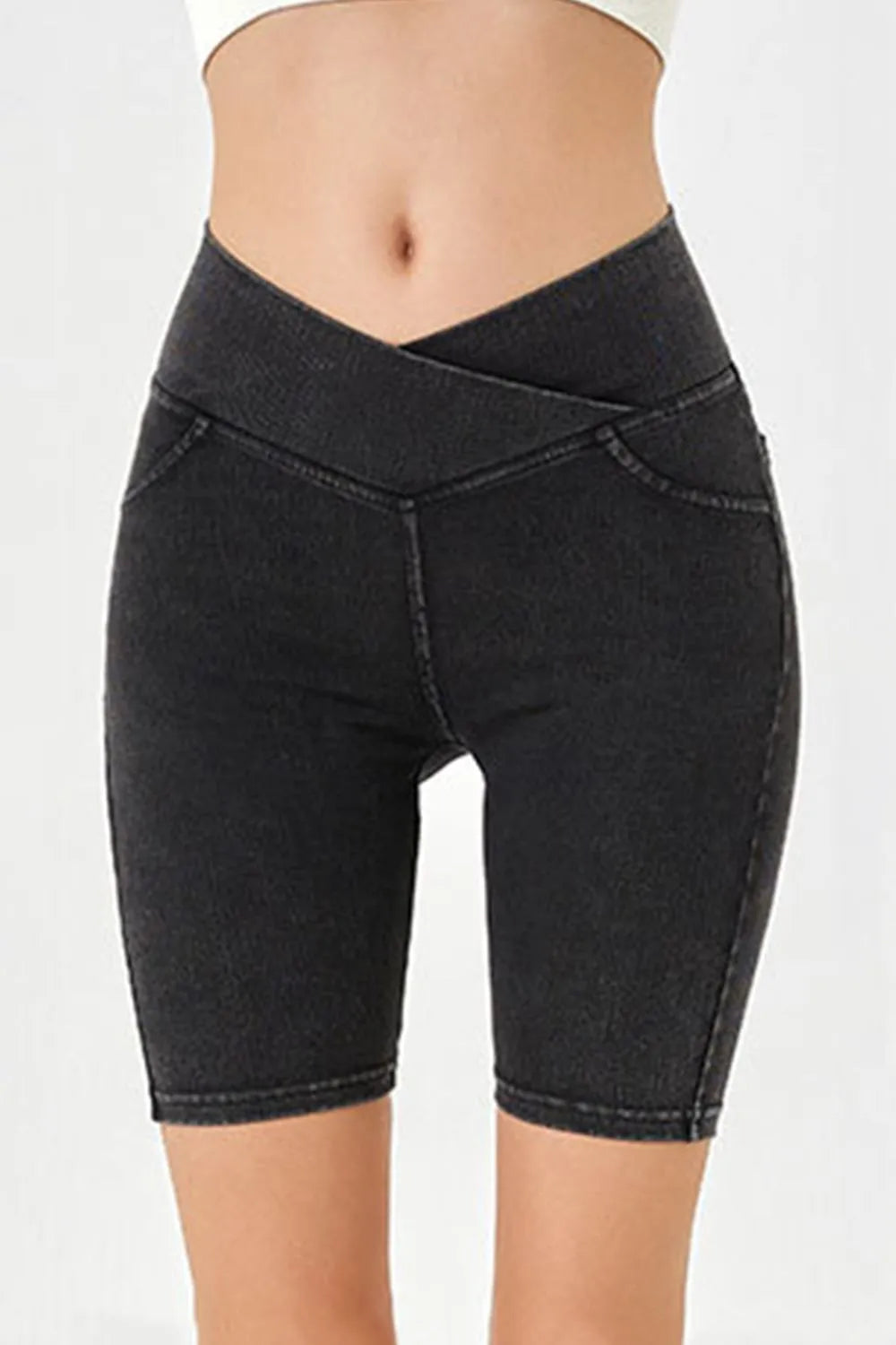 Peacock blue Basic Bae asymmetrical waist denim shorts with front and back pockets, stylish and casual for everyday wear.