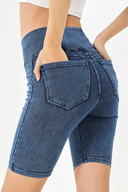 Peacock blue Basic Bae asymmetrical waist denim shorts with front pockets, stylish casual shorts by Trendsi.