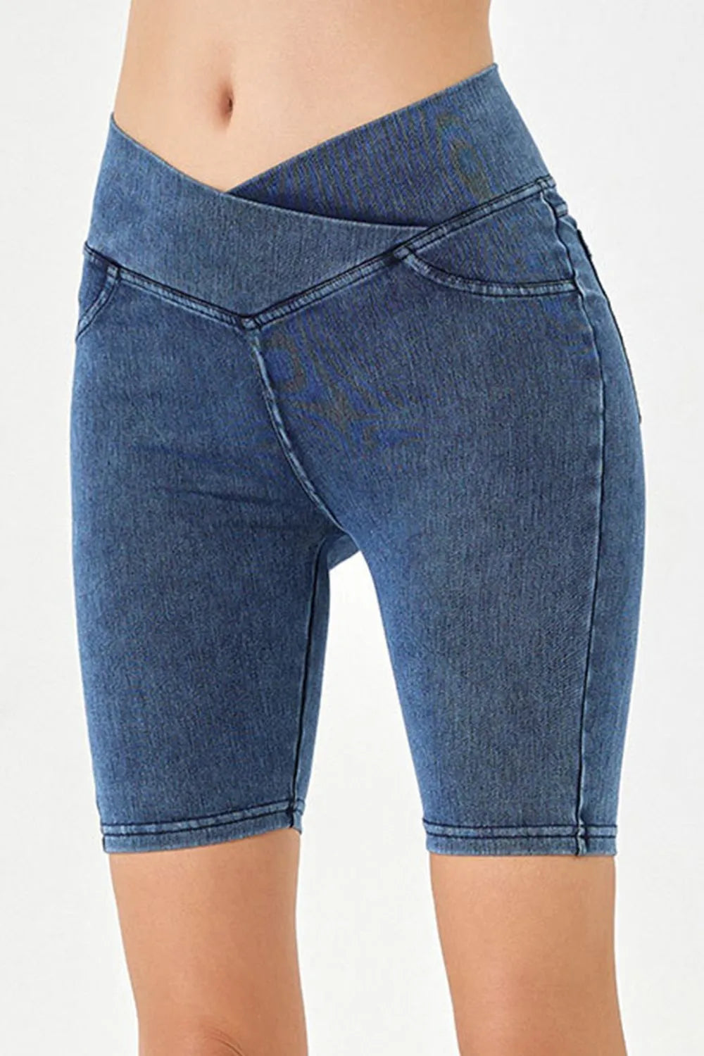 Peacock blue Basic Bae asymmetrical waist denim shorts with front pockets, trendy casual shorts by Trendsi.