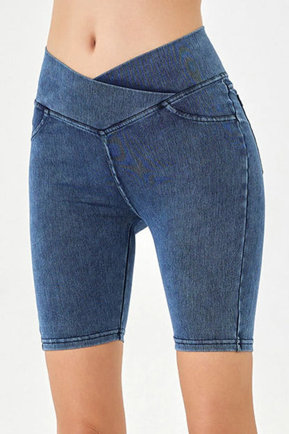 Peacock blue Basic Bae asymmetrical waist denim shorts with front pockets, trendy casual shorts by Trendsi.