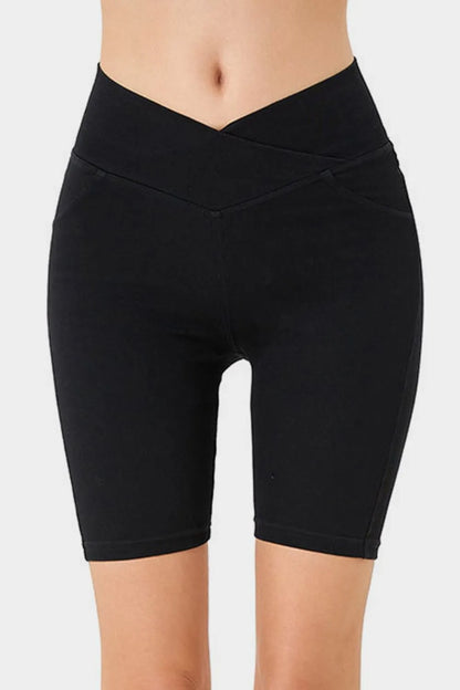 Peacock blue Basic Bae asymmetrical waist denim shorts with front pockets, casual trendy shorts from Trendsi.