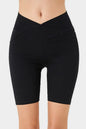 Peacock blue Basic Bae asymmetrical waist denim shorts with front pockets, casual trendy shorts from Trendsi.