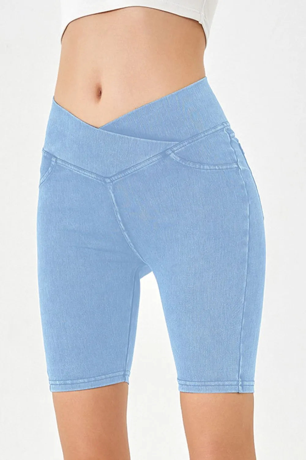 Peacock blue Basic Bae asymmetrical waist denim shorts with pockets, trendy casual shorts from Trendsi, stylish and comfortable fit.