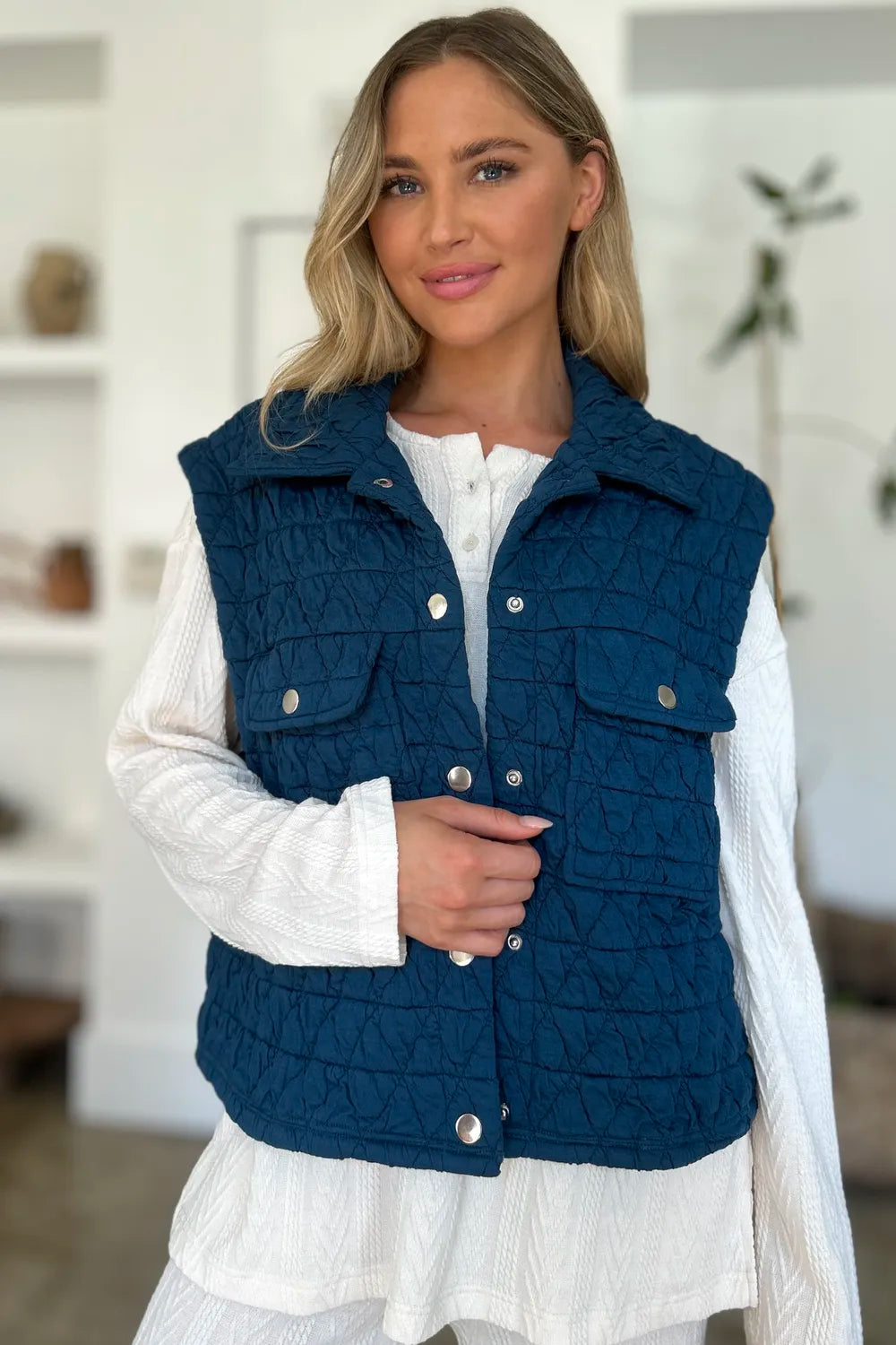 Peacock blue Trendsi Double Take full-size vest coat with textured fabric and snap-down front, featuring multiple pockets.