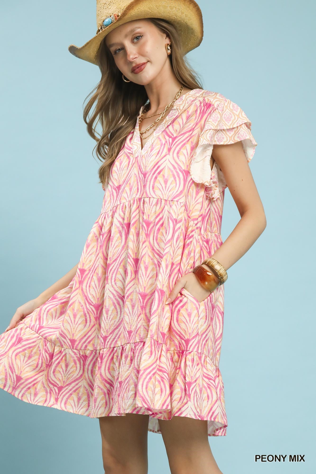 Umgee Mix Printed Flutter Sleeve Dress featuring colorful floral pattern and flutter sleeves, perfect for casual or semi-formal wear.