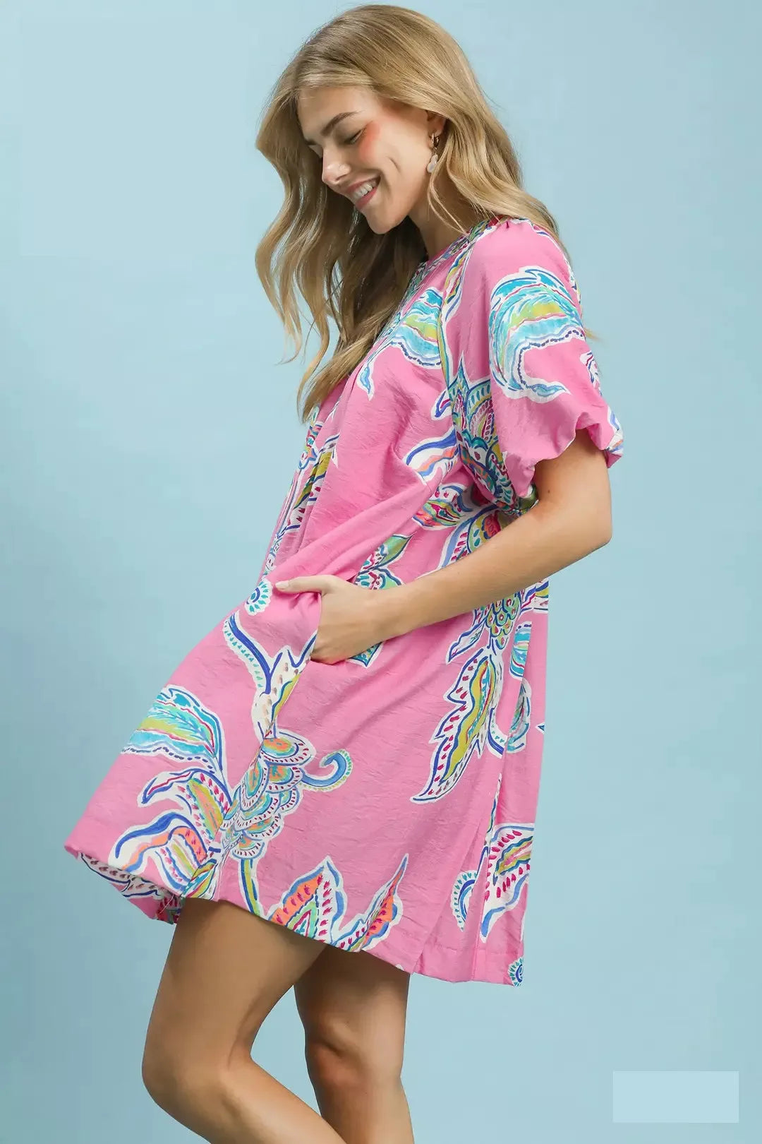 Umgee boho floral print mini dress with pockets, featuring a relaxed fit and lightweight fabric, ideal for casual summer wear.
