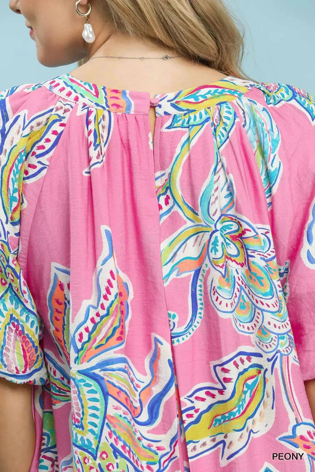Umgee boho floral print mini dress with pockets, featuring a relaxed fit and lightweight fabric for casual summer style.