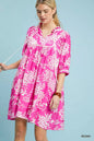 Umgee floral babydoll dress with pockets, featuring a flowy silhouette and vibrant floral pattern, perfect for casual wear.