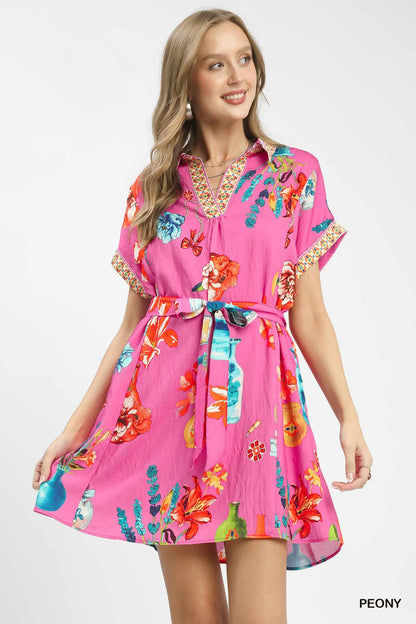 Trendsi Umgee floral print mini dress with belt, featuring a casual summer style and vibrant peony pattern.