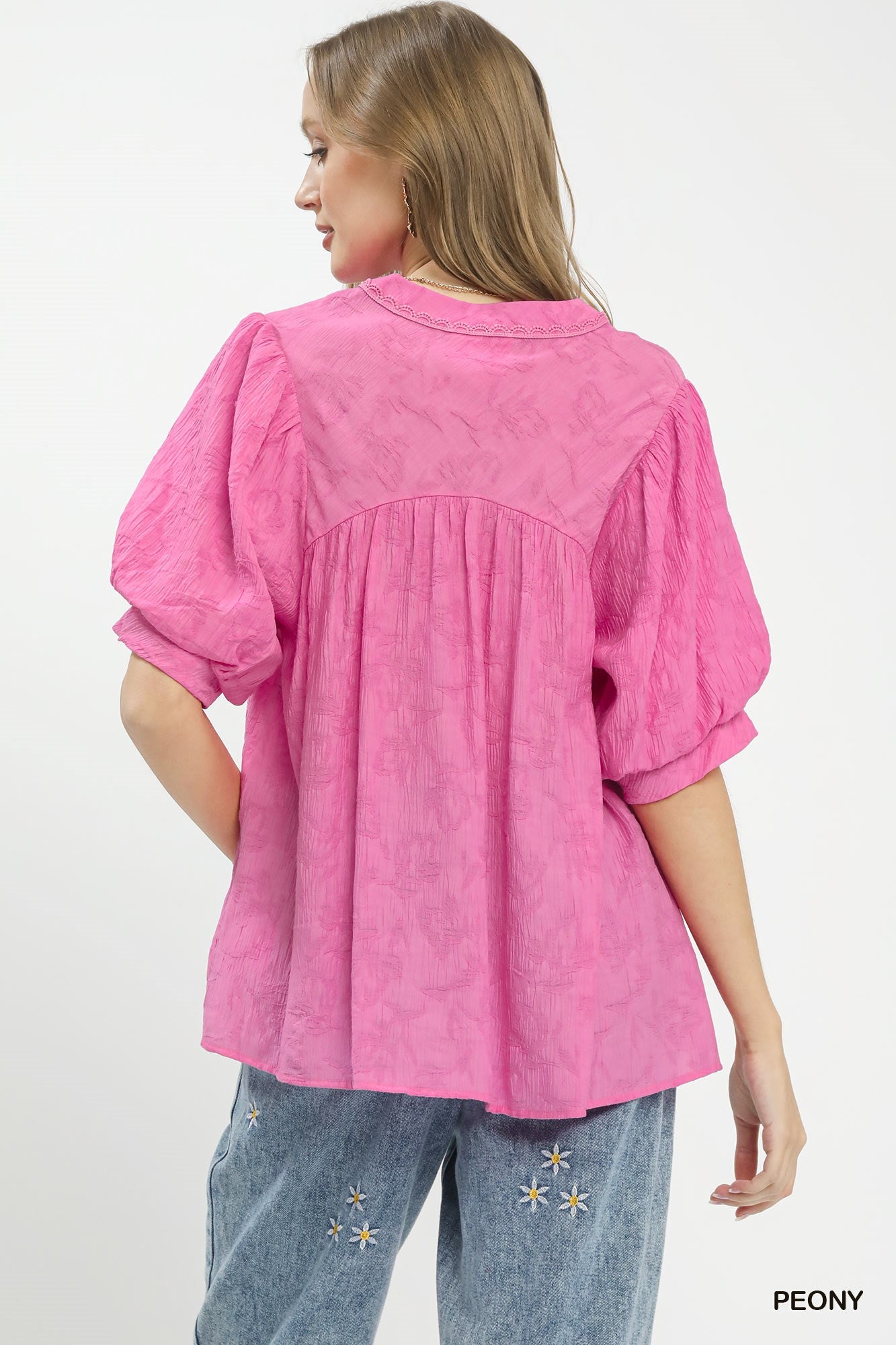 Umgee textured lace trim V-neck boho blouse with long sleeves and relaxed fit, featuring intricate lace details and a stylish neckline.
