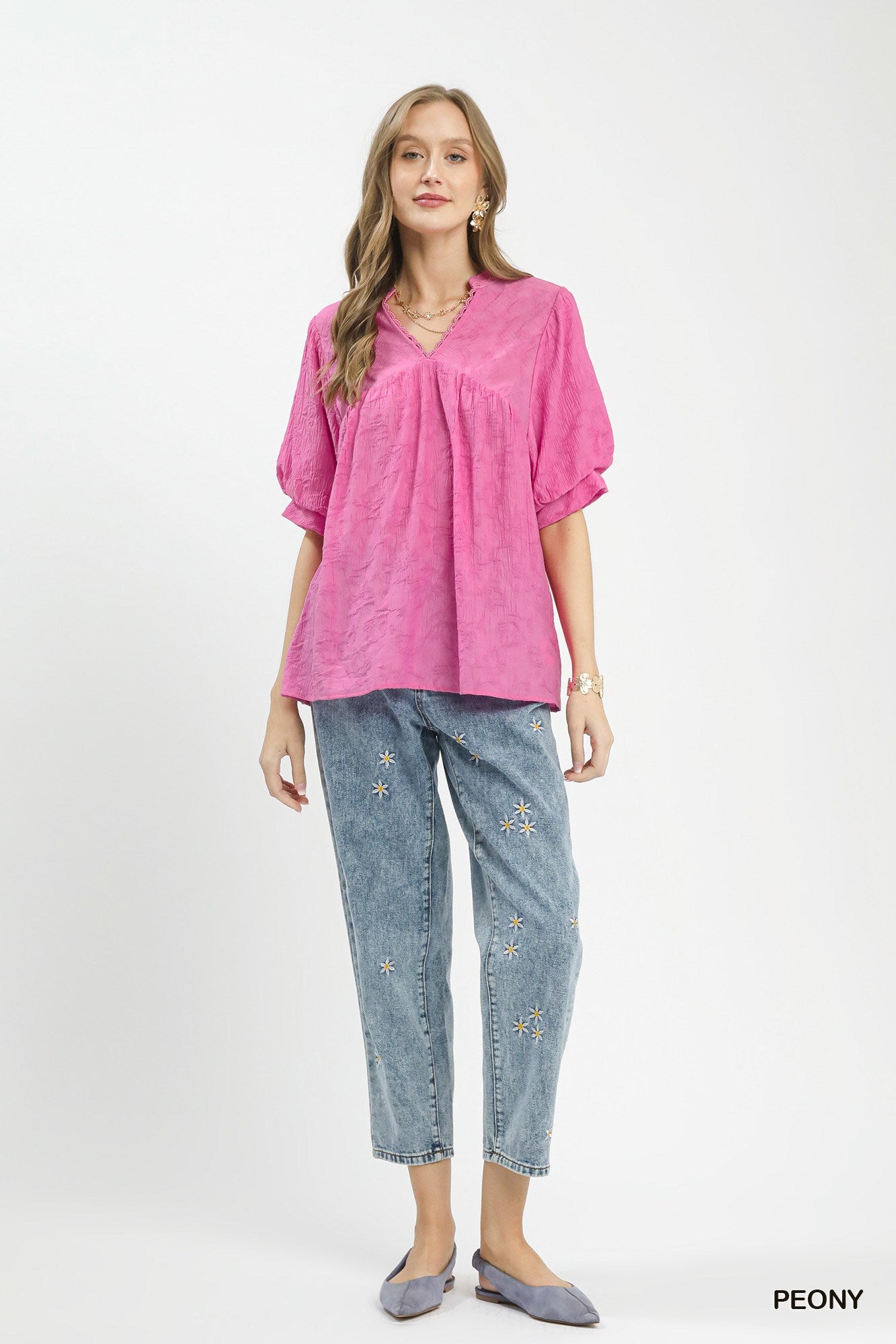 Umgee textured lace trim V-neck boho blouse with long sleeves and relaxed fit, featuring intricate lace details and a casual style.